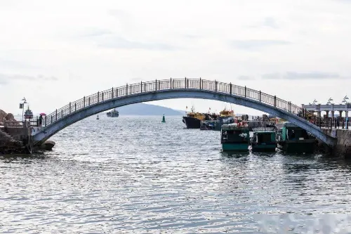 Arch Bridge Crossing Water